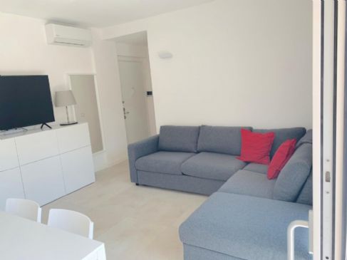 APPARTAMENTO MODERNO CON TERRAZZA E POSTO AUTO