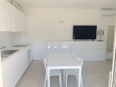 APPARTAMENTO MODERNO CON TERRAZZA E POSTO AUTO