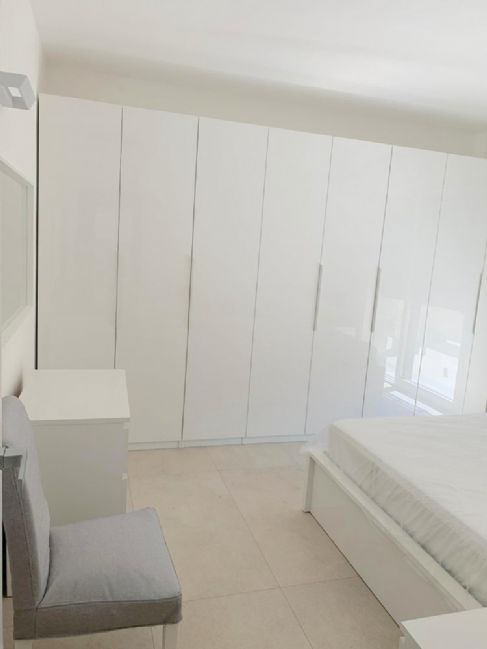 APPARTAMENTO MODERNO CON TERRAZZA E POSTO AUTO