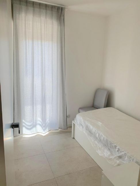 APPARTAMENTO MODERNO CON TERRAZZA E POSTO AUTO