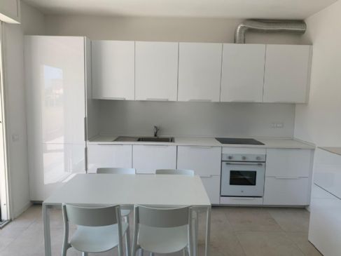 APPARTAMENTO MODERNO CON TERRAZZA E POSTO AUTO